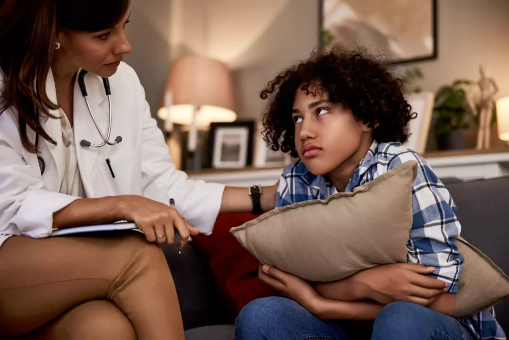 Teenager checking with Medical Personel